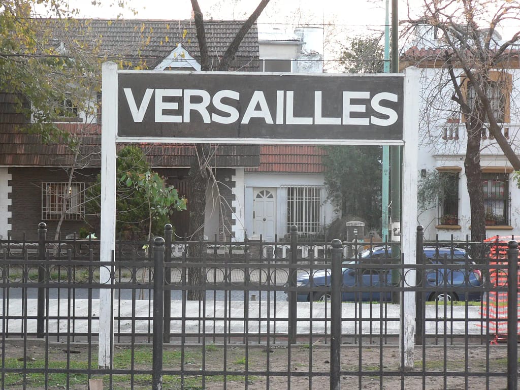 Cartel de la Vieja Estación Versailles